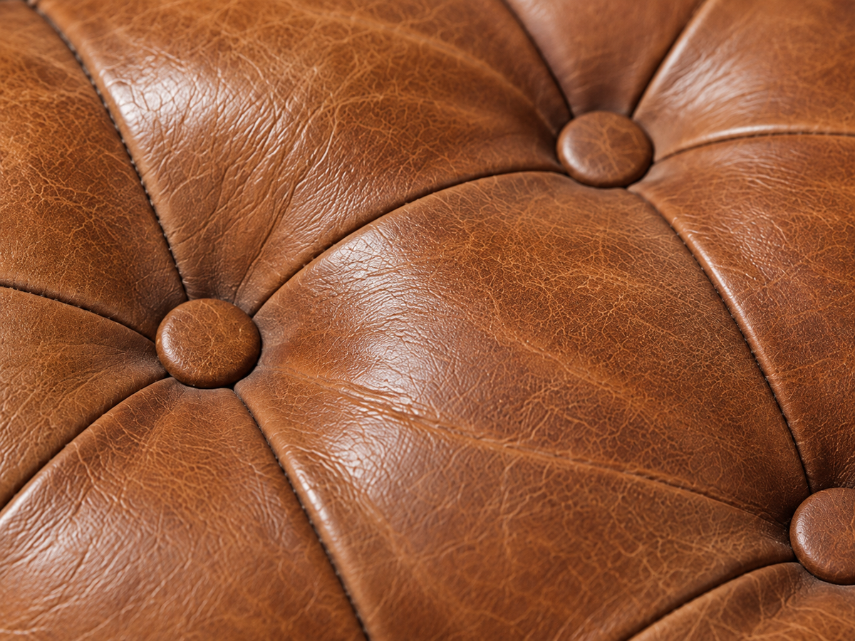 Runder Buffalo-Leder Ottoman mit Rollenfüßen – Braun